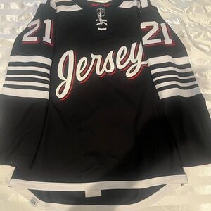 Black and White Jersey with Number 21